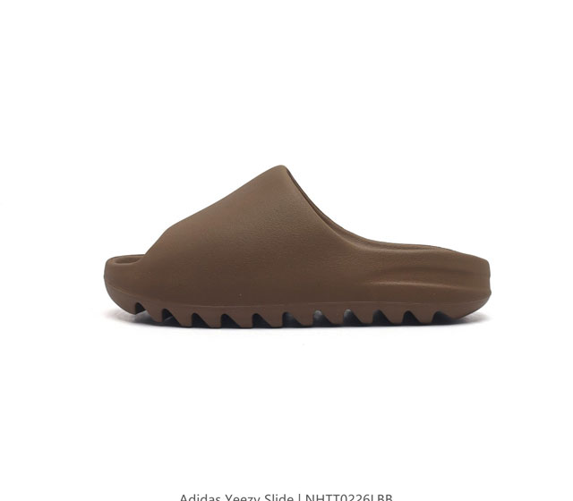 阿迪达斯 Adidas Yeezy Slide 经典运动拖鞋时尚厚底增高男女一字拖鞋 Yeezy Slide椰子拖鞋的外观十分吸引人 融合了舒适与时尚的元素 延