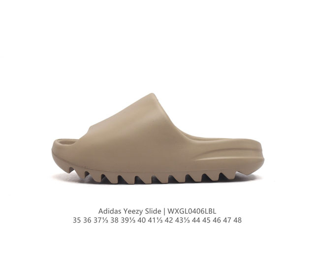 阿迪达斯 Adidas Yeezy Slide 经典运动拖鞋时尚厚底增高男女一字拖鞋。Yeezy Slide椰子拖鞋的外观十分吸引人，融合了舒适与时尚的元素，延 - 点击图像关闭
